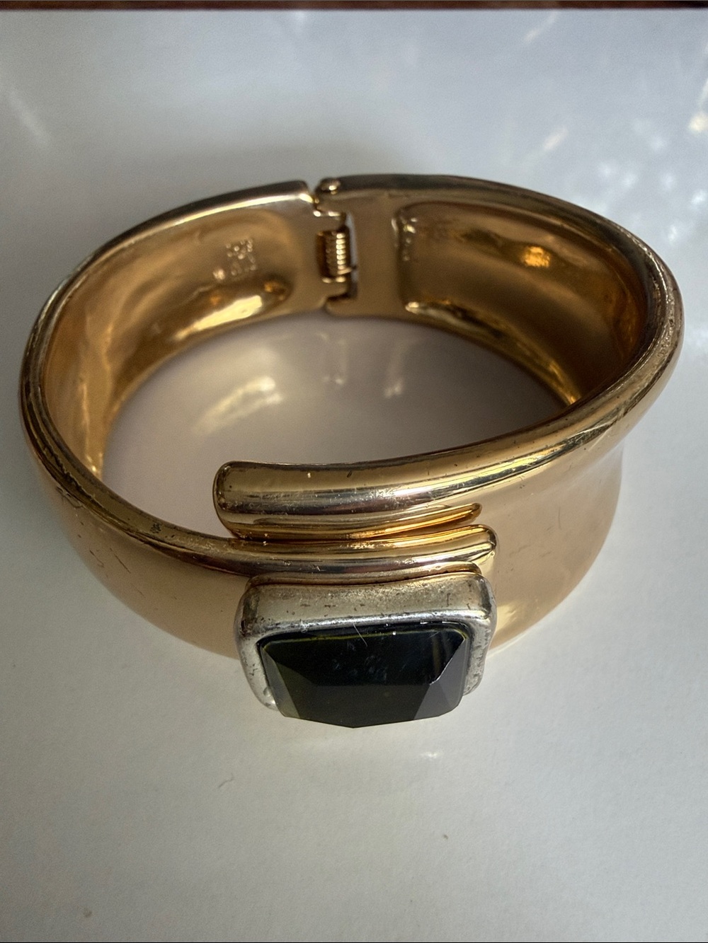 Gold-Tone Hinged Bracelet with Black Faceted Accent
